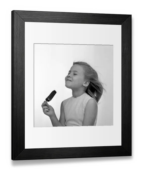 Framed Print : Ice cream in the 1960s. A young girl is having a chocolate ice cream