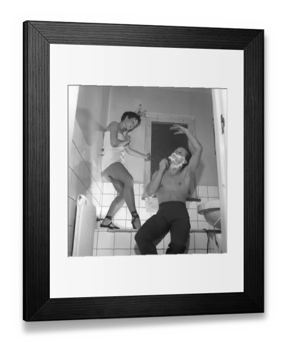 Framed Print : Ballerina in the 1950s. A young woman wearing a princess crown in the bathroom together with her husband Framed Print : Ballerina in the 1950s. A young woman wearing a princess crown in the bathroom together with her husband