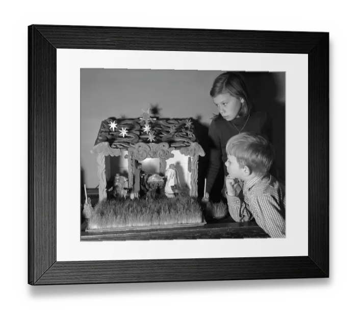 Framed Print : Christmas in the 1950s. Two children with a nativity scene Framed Print : Christmas in the 1950s. Two children with a nativity scene
