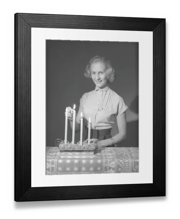 Framed Print : Christmas in the 1950s. Margit Sjoedin is lighting the candles at christmas Framed Print : Christmas in the 1950s. Margit Sjoedin is lighting the candles at christmas