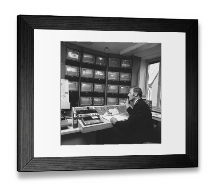 Framed Print : Subway safety in the 1970s. The feed from the subway surveillance cameras are monitored Framed Print : Subway safety in the 1970s. The feed from the subway surveillance cameras are monitored