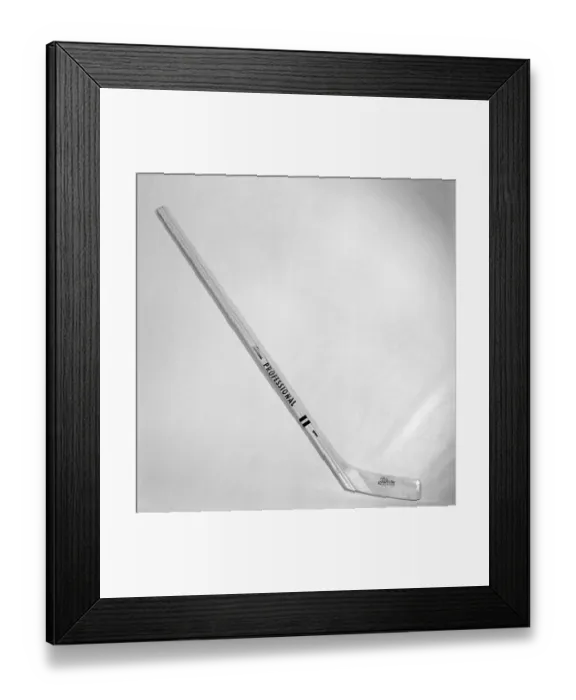 Framed Print : Ice hockey in the 1960s. Detail of the popular ice hockey ice hockey stick used by players in this decade