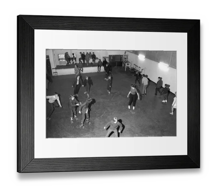 Framed Print : Roller skate fun in the 1960s. Interior of a roller disco with people roller skating Framed Print : Roller skate fun in the 1960s. Interior of a roller disco with people roller skating