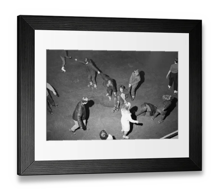 Framed Print : Roller skate fun in the 1960s. Interior of a roller disco with people roller skating Framed Print : Roller skate fun in the 1960s. Interior of a roller disco with people roller skating