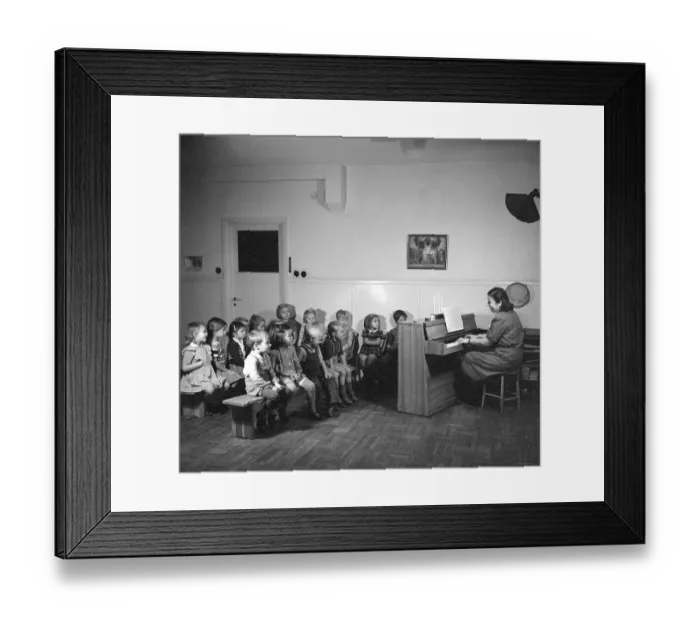 Framed Print : 1940s children. A group of children are singing christmas songs at a nursery school in Stockholm. Sweden 1947. Conard ref 884