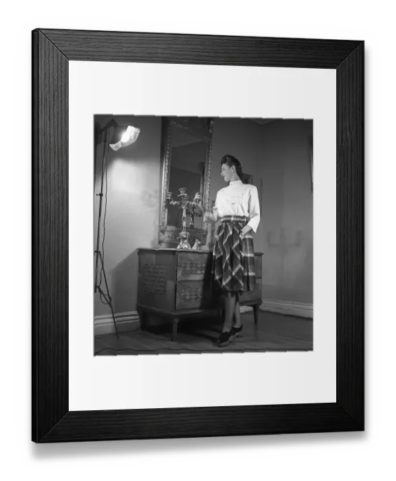 Framed Print : Women's fashion in the 1940s. A young woman photographed for a ladies magazine to show the women's fashion of 1945