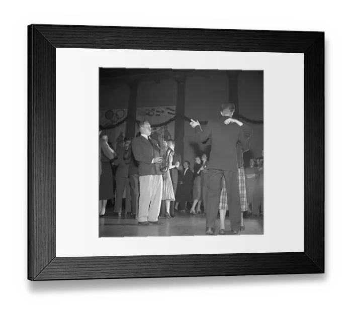 Framed Print : Dancing in the 1950s. The dance floor is filled with dancing couples moving to the music Framed Print : Dancing in the 1950s. The dance floor is filled with dancing couples moving to the music