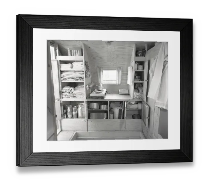 Framed Print : 1950s camping. A family is enjoying their holiday and the practial camping life in their caravan