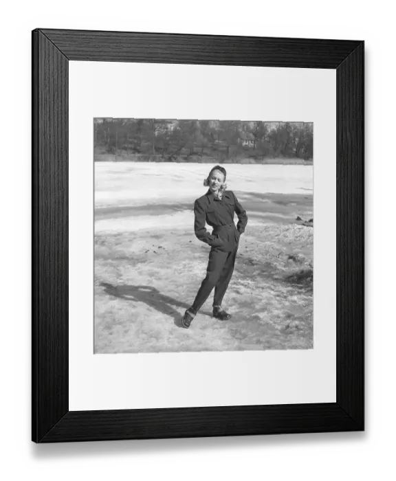 Framed Print : Dressed for autumn and winter in the 1940s A young woman is wearing a jacket. ski pants and ski boots. Sweden 1947. Kristoffersson ref AB15-3