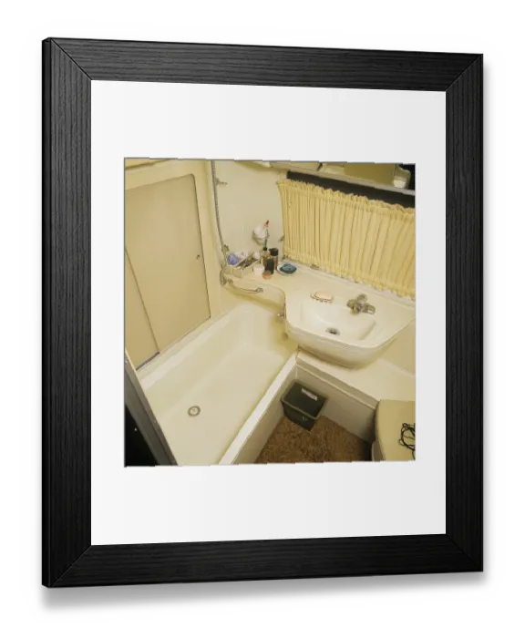 Framed Print : 1970s camping. Pictured an American Airstream caravan in aluminium and in the typical 1930s streamline design