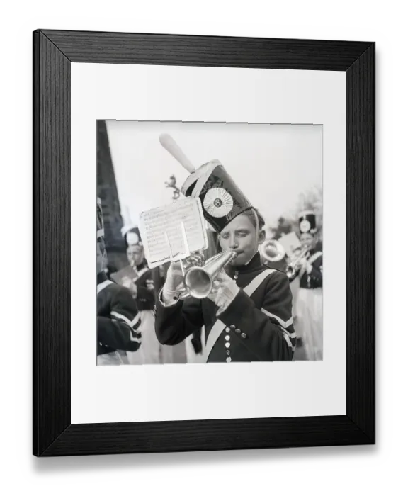 Framed Print : Music in the 1940s. Young boys in an orchestra is performing and playing outdoors