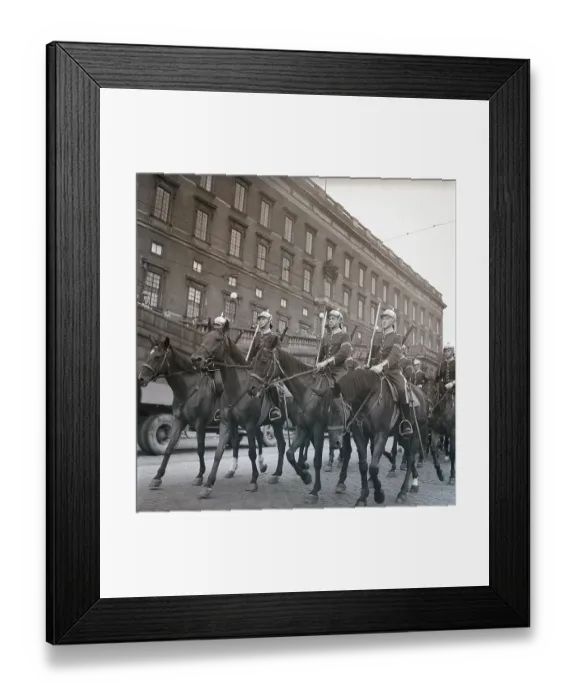 Framed Print : 1940s soldiers on horses. In the street with the royal castle in Stockholm in the background, soldiers are riding by for the changing of the guards ceremony. Ref Kristoffersson AD32-8. 1947 Framed Print : 1940s soldiers on horses. In the street with the royal castle in Stockholm in the background, soldiers are riding by for the changing of the guards ceremony. Ref Kristoffersson AD32-8. 1947