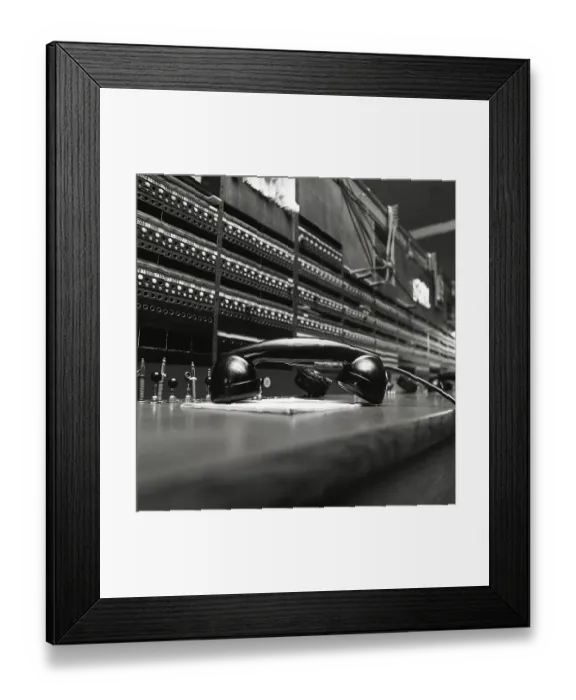 Framed Print : Telephony in the 1970s. Interior from an empty room with a large switchboard visible Framed Print : Telephony in the 1970s. Interior from an empty room with a large switchboard visible