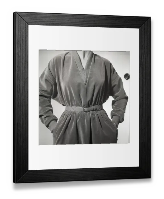 Framed Print : 1950s fashion. A young woman in a typical 1950s outfit with a belt in leather