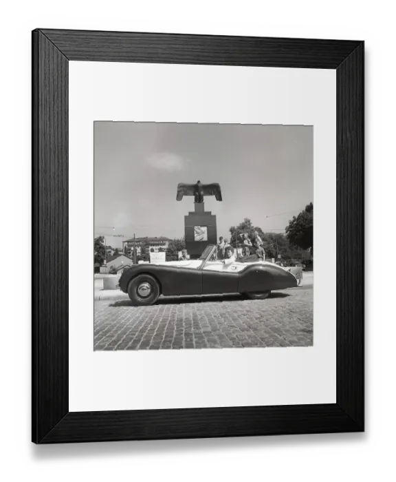 Framed Print : Driving in the 1950s. A young woman in an open convertible Jaguar XK120 Framed Print : Driving in the 1950s. A young woman in an open convertible Jaguar XK120