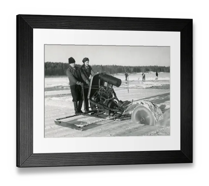 Framed Print : Workers collecting ice. Two men are sawing blocks of ice to use in homes to keep groceries cool