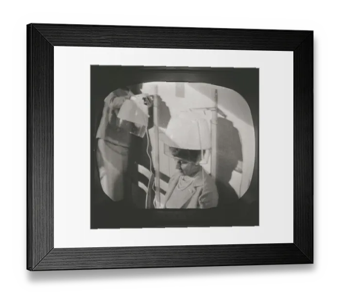 Framed Print : Television in the 1950s. A typical tv screen photographed when a broadcast is