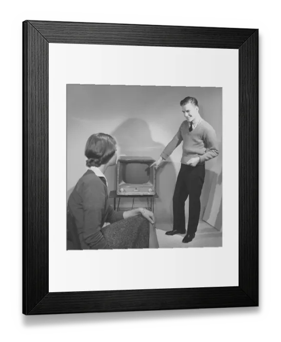 Framed Print : Television in the 1950s. A young couple is pictured with a typical 50s television set. Photo Kristoffersson ref CC94-2. Sweden 1958 Framed Print : Television in the 1950s. A young couple is pictured with a typical 50s television set. Photo Kristoffersson ref CC94-2. Sweden 1958