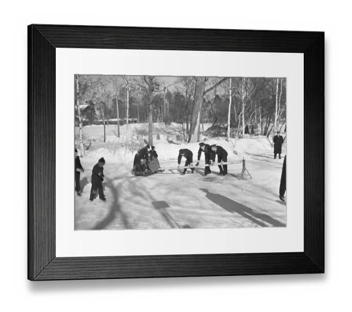 Framed Print : Swing toboggan in the 1940s. Three sailors in uniform is powering the sledge circling around a centrum pole Framed Print : Swing toboggan in the 1940s. Three sailors in uniform is powering the sledge circling around a centrum pole