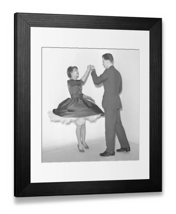 Framed Print : Dancing in the 1950s. A young couple is dancing in the 1950