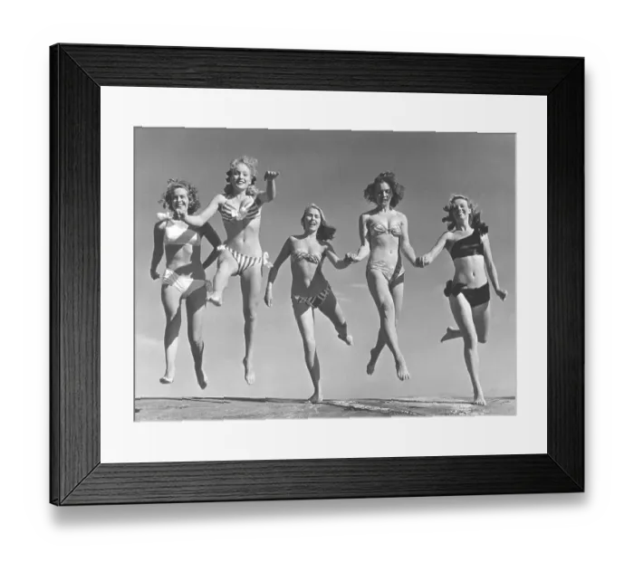 Framed Print : 1940s summer. A group of young women in their bikinis are happy on this summer's day Framed Print : 1940s summer. A group of young women in their bikinis are happy on this summer's day