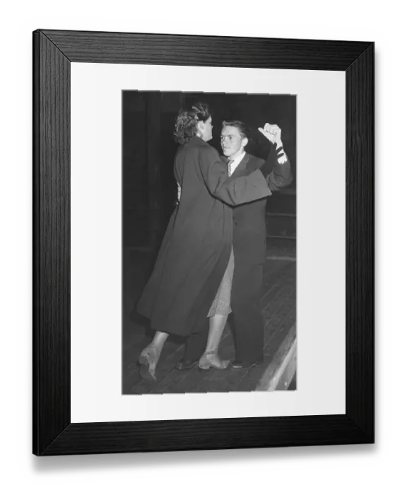 Framed Print : Dancing in the 1940s. A couple at a dance holding each other close Framed Print : Dancing in the 1940s. A couple at a dance holding each other close
