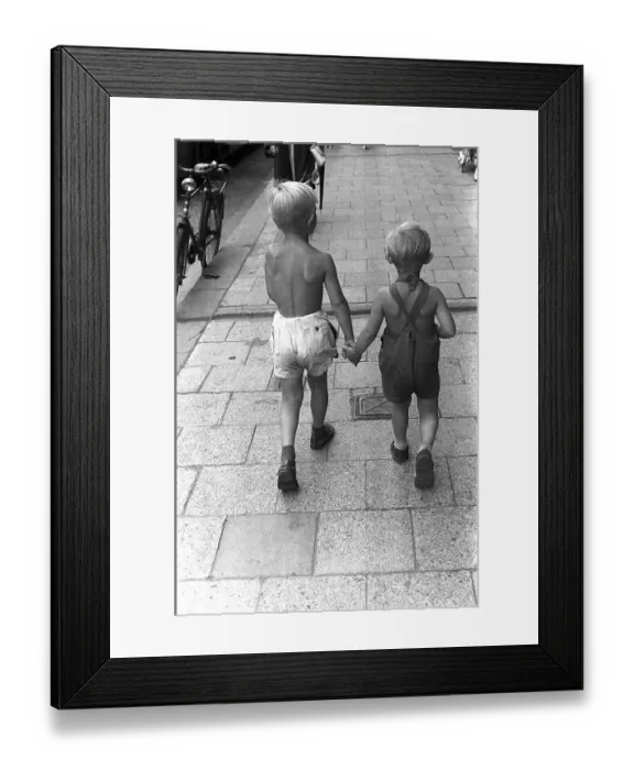 Framed Print : Summer in the 1950s. Two children boys walks along the pavement and holds each other hands. Sweden 1954. Kristoffersson BC42-12 Framed Print : Summer in the 1950s. Two children boys walks along the pavement and holds each other hands. Sweden 1954. Kristoffersson BC42-12