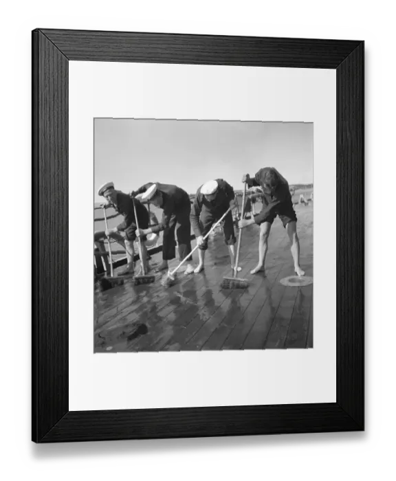Framed Print : During World war II. The war ship Sverige during navy exercises at sea. Four sailors are seen scrubbing the deck in the sunshine. Sweden june 1940. Kristoffersson ref 141