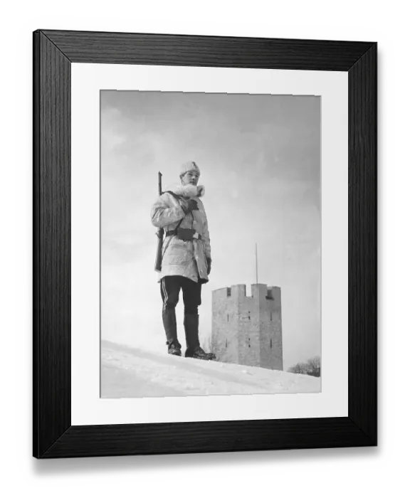 Framed Print : Swedish army during WW2. A soldier is standing on guard outside the swedish town Visby on the island Gotland Framed Print : Swedish army during WW2. A soldier is standing on guard outside the swedish town Visby on the island Gotland