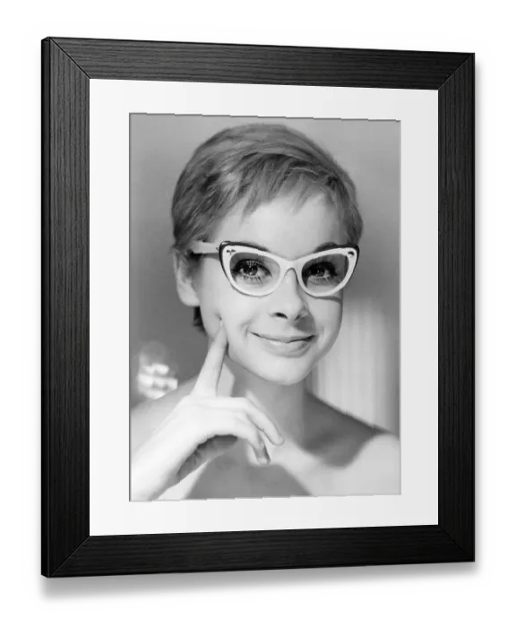 Framed Print : 1960s glasses. A young woman in glasses and bows January 1961. Models name Monica Flodqvist