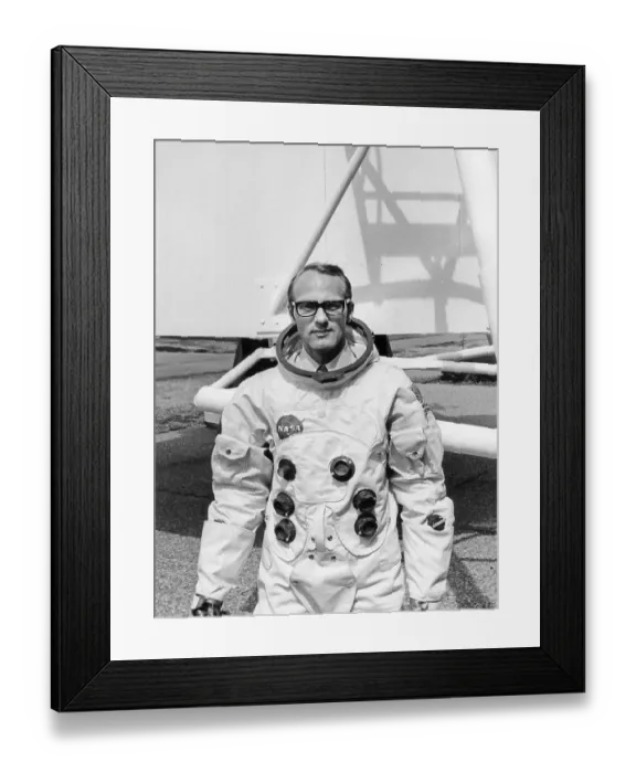 Framed Print : A man in an American austronaut Nasa spacesuit