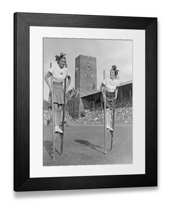 Framed Print : 1950s couple. Actress Sickan Carlsson to the right and a friend are walking