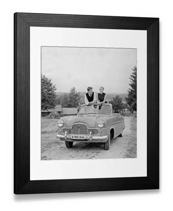 Framed Print : Driving in the 1950s. A couple is seen sitting in their car, a Ford Zephy convertible. Sweden 1955 Framed Print : Driving in the 1950s. A couple is seen sitting in their car, a Ford Zephy convertible. Sweden 1955