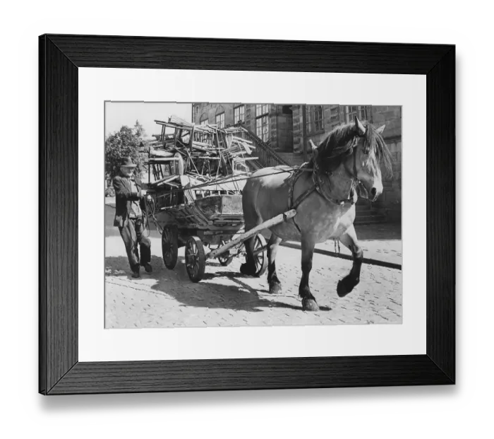 Framed Print : Horse and carriage. A man with his horse and carriage in a street in Joenkoeping Sweden. The carriage is full och furniture being transported. Sweden 1970 Framed Print : Horse and carriage. A man with his horse and carriage in a street in Joenkoeping Sweden. The carriage is full och furniture being transported. Sweden 1970