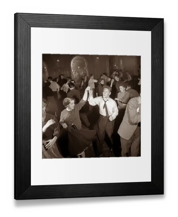 Framed Print : Dancing in the 1950s. The dance floor is filled with dancing couples moving to the music Framed Print : Dancing in the 1950s. The dance floor is filled with dancing couples moving to the music