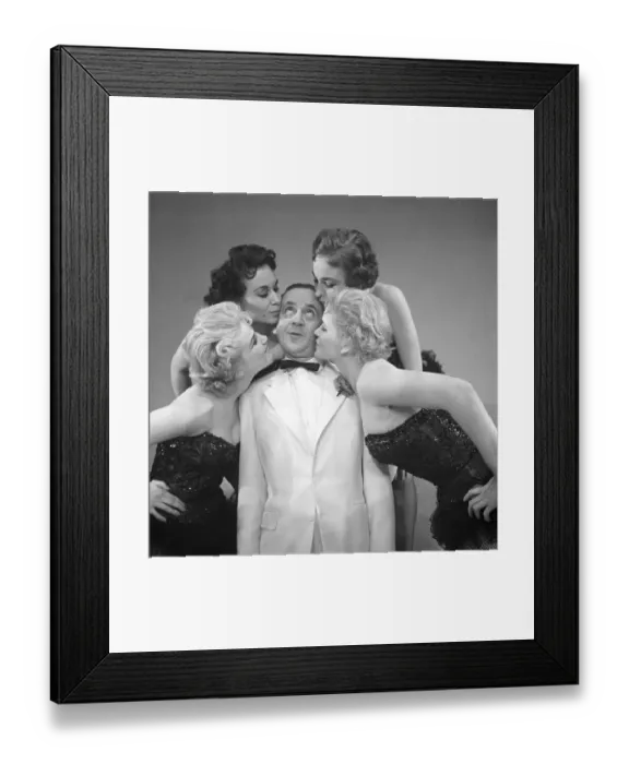 Framed Print : Fun in the 1950s. A group of women is paying much attention to the man in the middle. A group of people from the theatre are fooling around when rehersing. He is actor Ake Soederblom, 1910-1965. Sweden 1955. Photo Kristoffersson Ref BR116-12