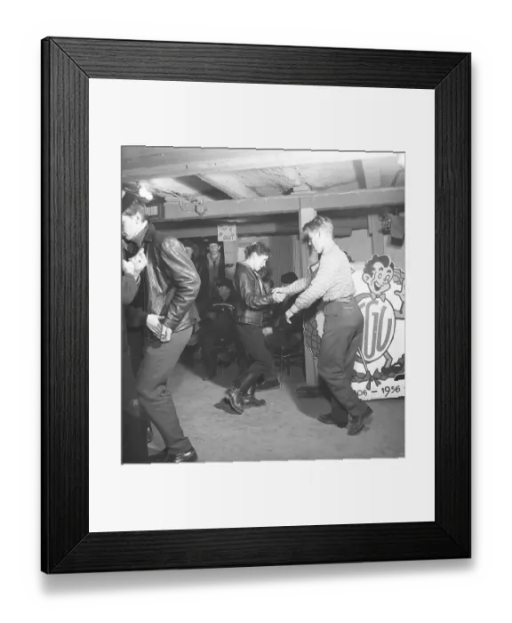 Framed Print : Dancing in the 1950s. Young people at a party held at their club Framed Print : Dancing in the 1950s. Young people at a party held at their club