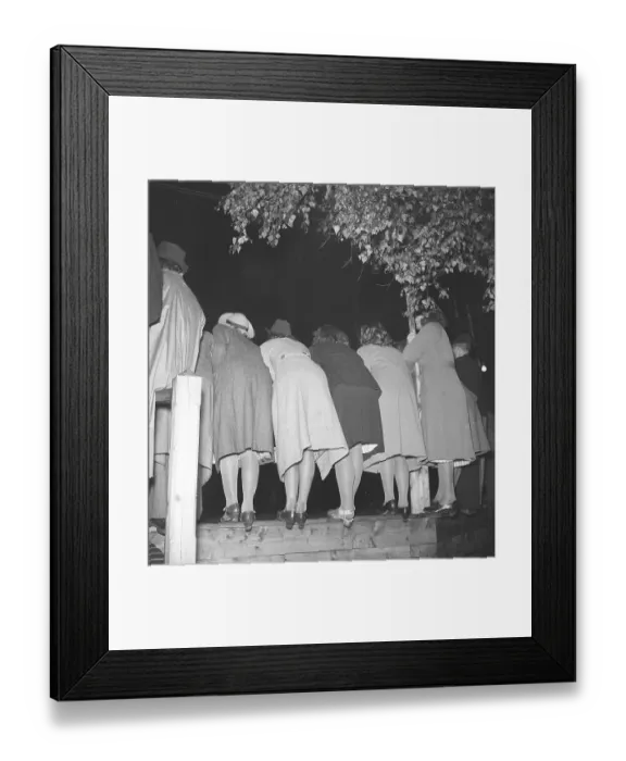 Framed Print : Dancing in the 1940s. A group of young women are standing against the side at a dance event