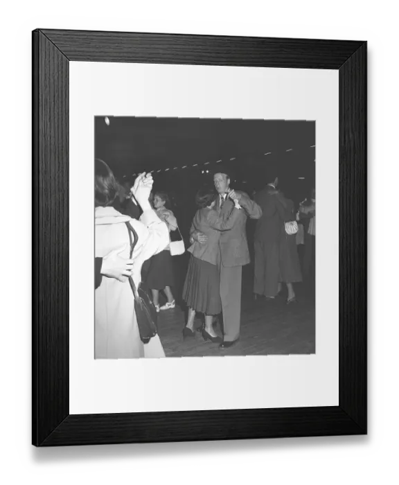Framed Print : Dancing in the 1940s. A young couple at a dance event is whirling around on the dance floor Framed Print : Dancing in the 1940s. A young couple at a dance event is whirling around on the dance floor