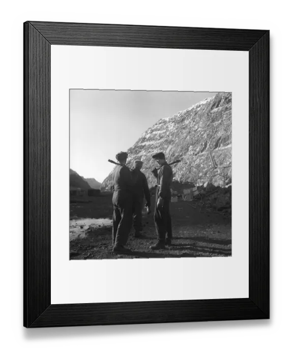 Framed Print : Kiruna Sweden in the 1950s. The open mine and a miners with tools on their shoulders