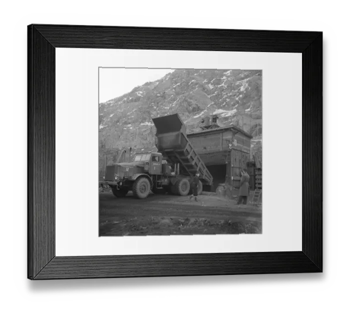 Framed Print : Kiruna Sweden in the 1950s. The Kiruna mine and a truck transporting the mined material