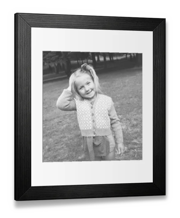 Framed Print : Girl in the 1940s. A charming and smiling girl is looking at the photographer. Sweden 1947. Kristoffersson V15-4 Framed Print : Girl in the 1940s. A charming and smiling girl is looking at the photographer. Sweden 1947. Kristoffersson V15-4