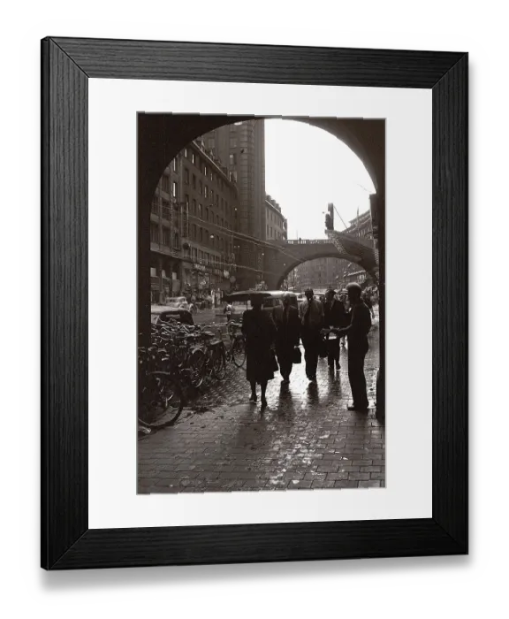 Framed Print : Rainy street in the 1950s. People are walking under umbrellas along a street a rainy day. Kungsgatan Stockholm 1953. Photo Kristoffersson ref 1.1-31