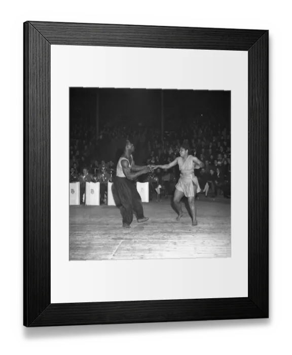 Framed Print : Dancing in the 1940s. Performance dancers on the dance floor at a show where dancing and acting is combined Framed Print : Dancing in the 1940s. Performance dancers on the dance floor at a show where dancing and acting is combined