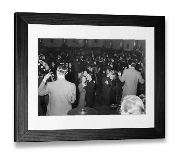 Framed Print : Dancing in the 1940s. The dance floor is filled with dancing couples moving to the band and he music. Picture taken at Nalen in Stockholm Sweden in the 1940s Framed Print : Dancing in the 1940s. The dance floor is filled with dancing couples moving to the band and he music. Picture taken at Nalen in Stockholm Sweden in the 1940s