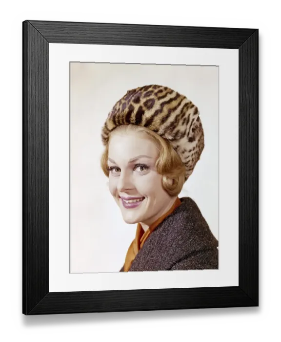 Framed Print : Woman of the 1960s. She is wearing a winter fur hat Framed Print : Woman of the 1960s. She is wearing a winter fur hat