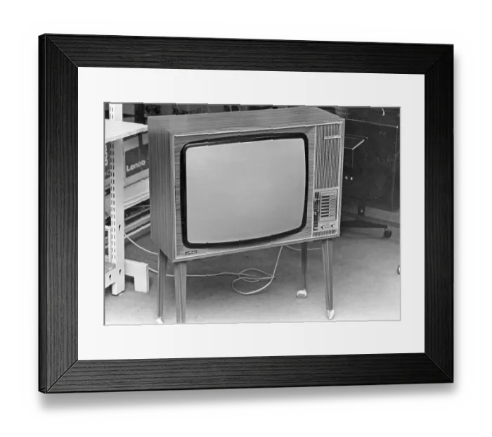 Framed Print : Television in the 1970s. A tv set on legs from the german manufacturer Metz