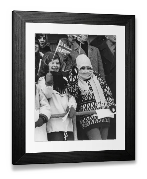 Framed Print : Winter in the 1960s. Two happy young women are cheering on their norwegian favorites with flags and cheers Framed Print : Winter in the 1960s. Two happy young women are cheering on their norwegian favorites with flags and cheers