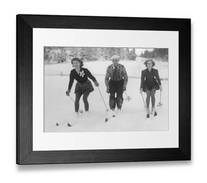 Framed Print : Skiing in the 1940s. The three individual skiing champions Britta Rahlen, Sven Selanger and Britta Lindmark are skiing through the snow. Sweden 1945