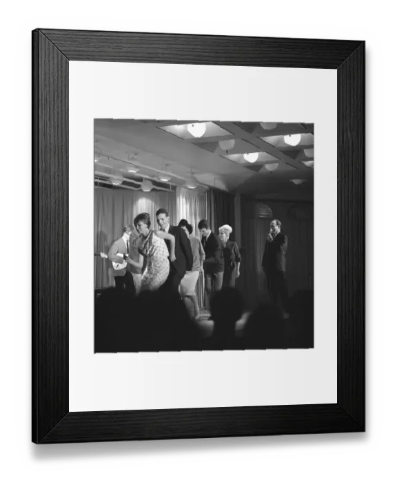 Framed Print : Dancing in the 1960s. The dance Hully Gully is being made popular and here are men and women dancing the new craze